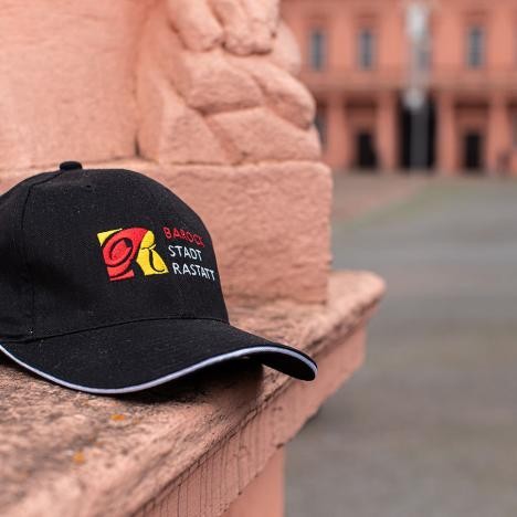 Cap Cap Rastatt black. Available at the tourist information at the castle